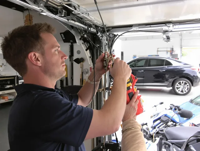 Richmond Hill Garage Door Repair safety certified technician performing cable replacement in Richmond Hill