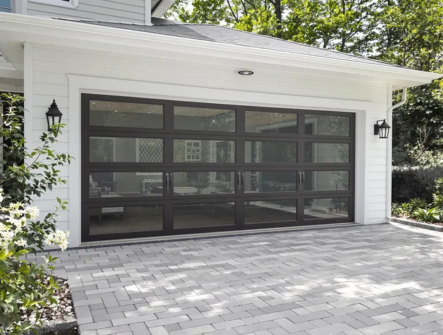 Richmond Hill Garage Door Repair design specialist presenting custom garage door options to Richmond Hill homeowner