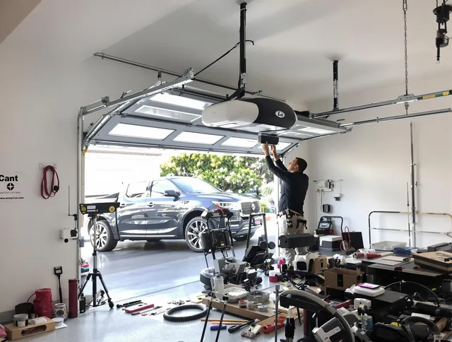 Richmond Hill Garage Door Repair specialist installing smart garage door opener system in Richmond Hill home