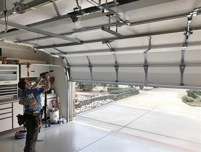 Garage door track repair service by Richmond Hill Garage Door Repair in Richmond Hill